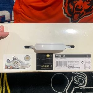 Adidas Intelligence 1.1 Brand New in box. White/Gold size 12